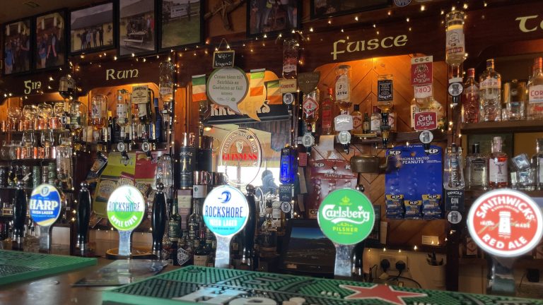 Beer taps and bar interior at Krugers Pub, the most westerly pub in Europe, Dunquin on the Dingle Way.