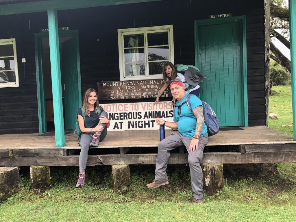 Mount Kenya hikers outside Anabas Mount Lodge cabin on the Chogoria Route.