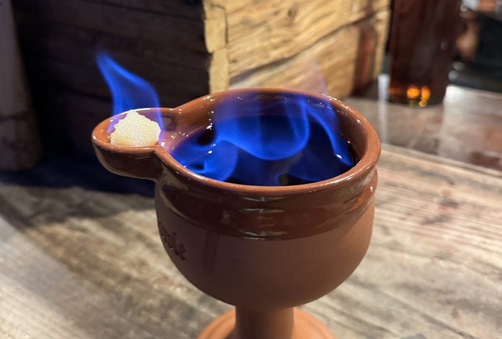 Traditional Feuerzangenbowle flaming drink at Munich Christmas Market