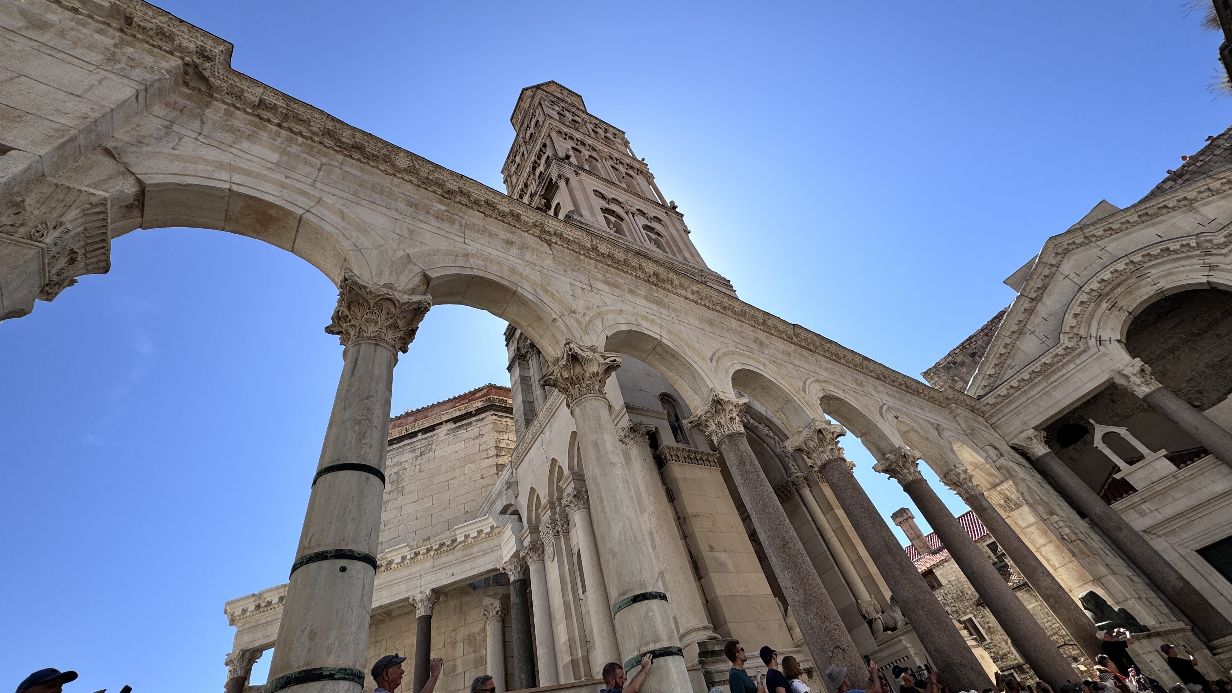 View of the bell tower and arches of Diocletian’s Palace in Split, Croatia, on a clear summer day