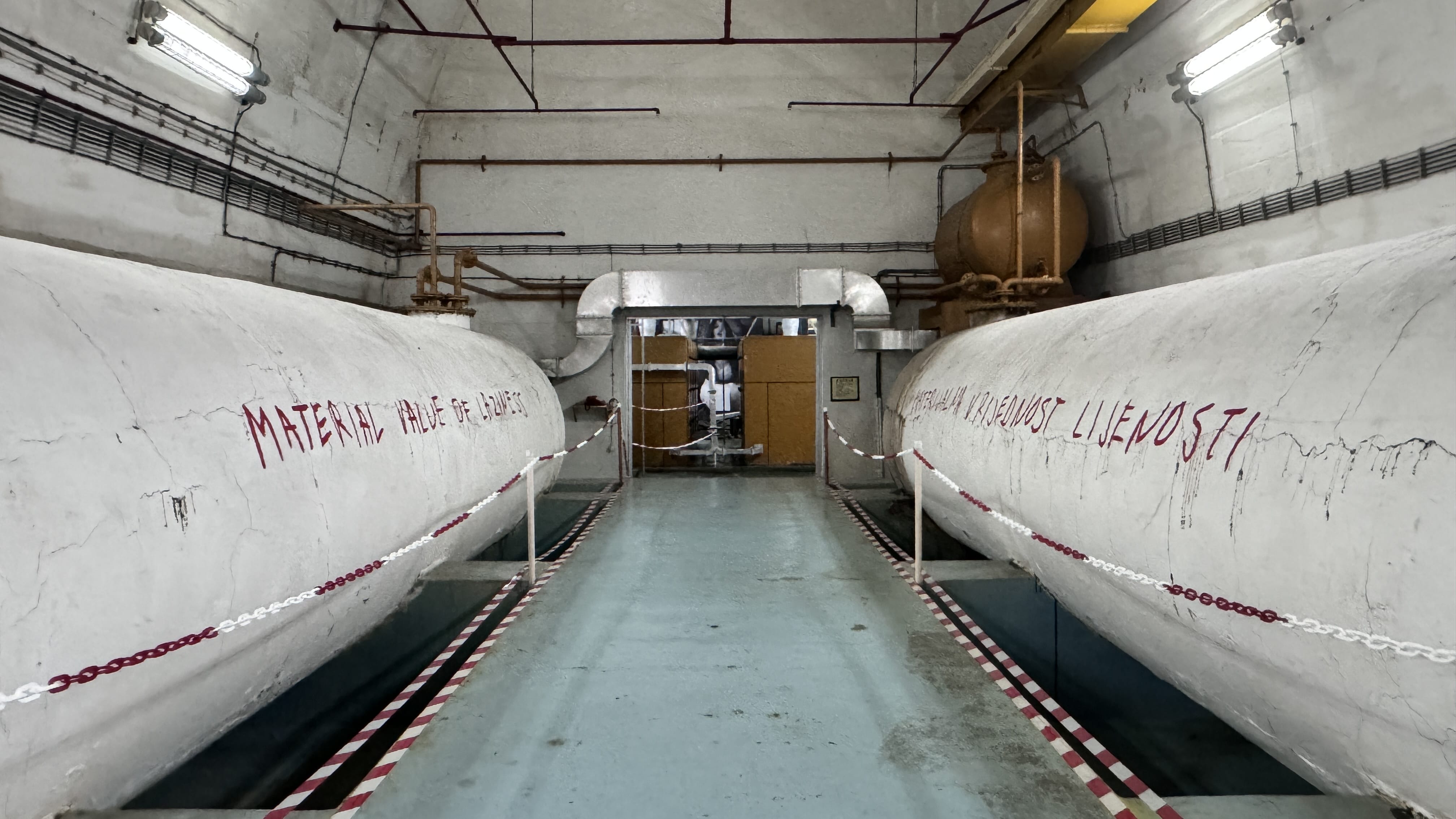 Cold War-era tanks and industrial equipment inside Tito’s underground bunker near Konjic
