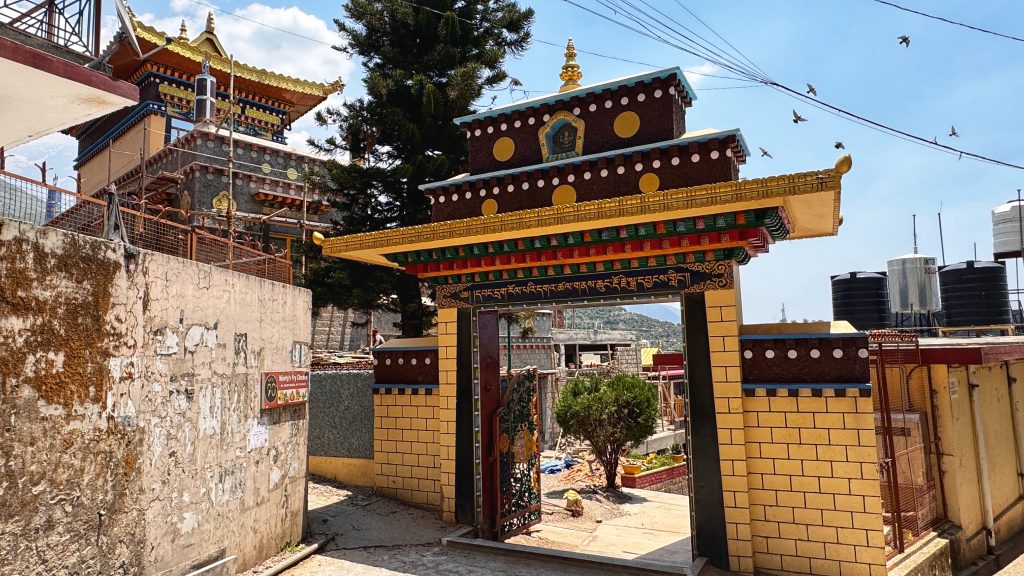 The striking entrance to Nechung Monastery, the seat of the State Oracle of Tibet and a sacred place of prophecy and ritual.