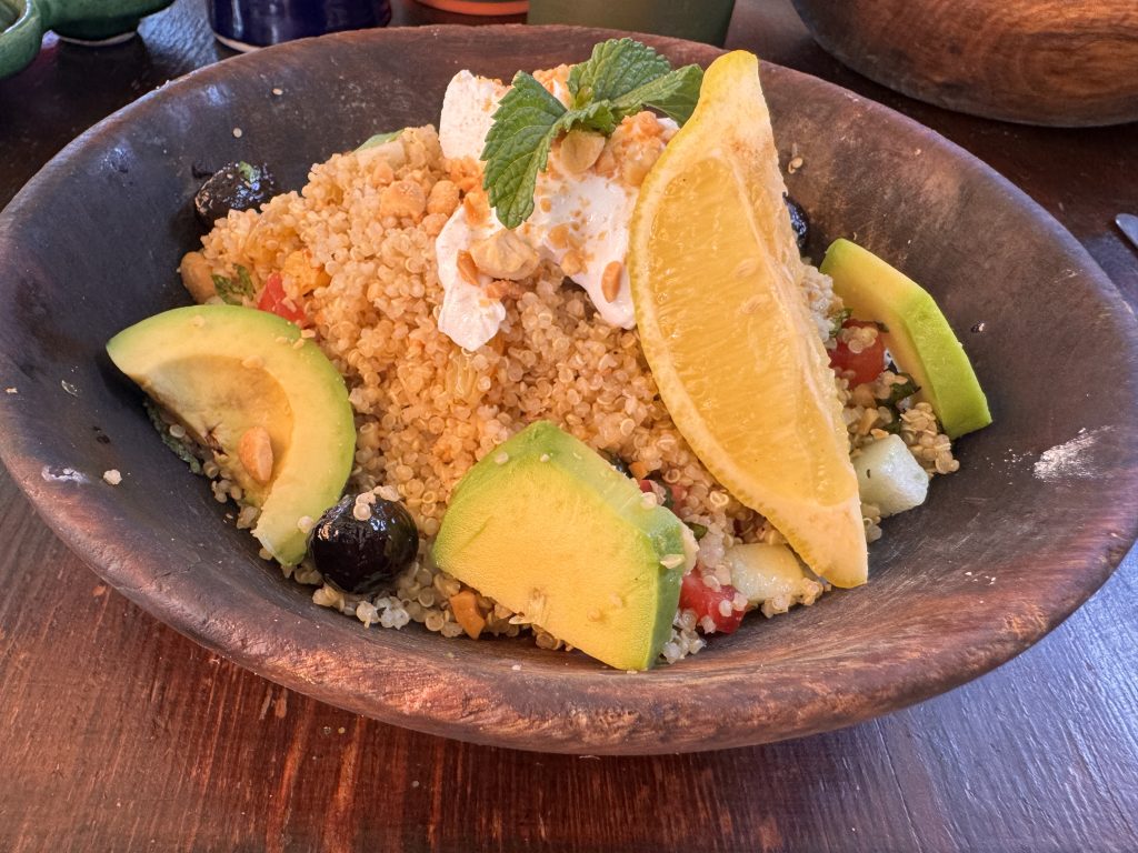 A quinoa salad with avocado, orange, raisins, and mint served at Zeitoun Café.