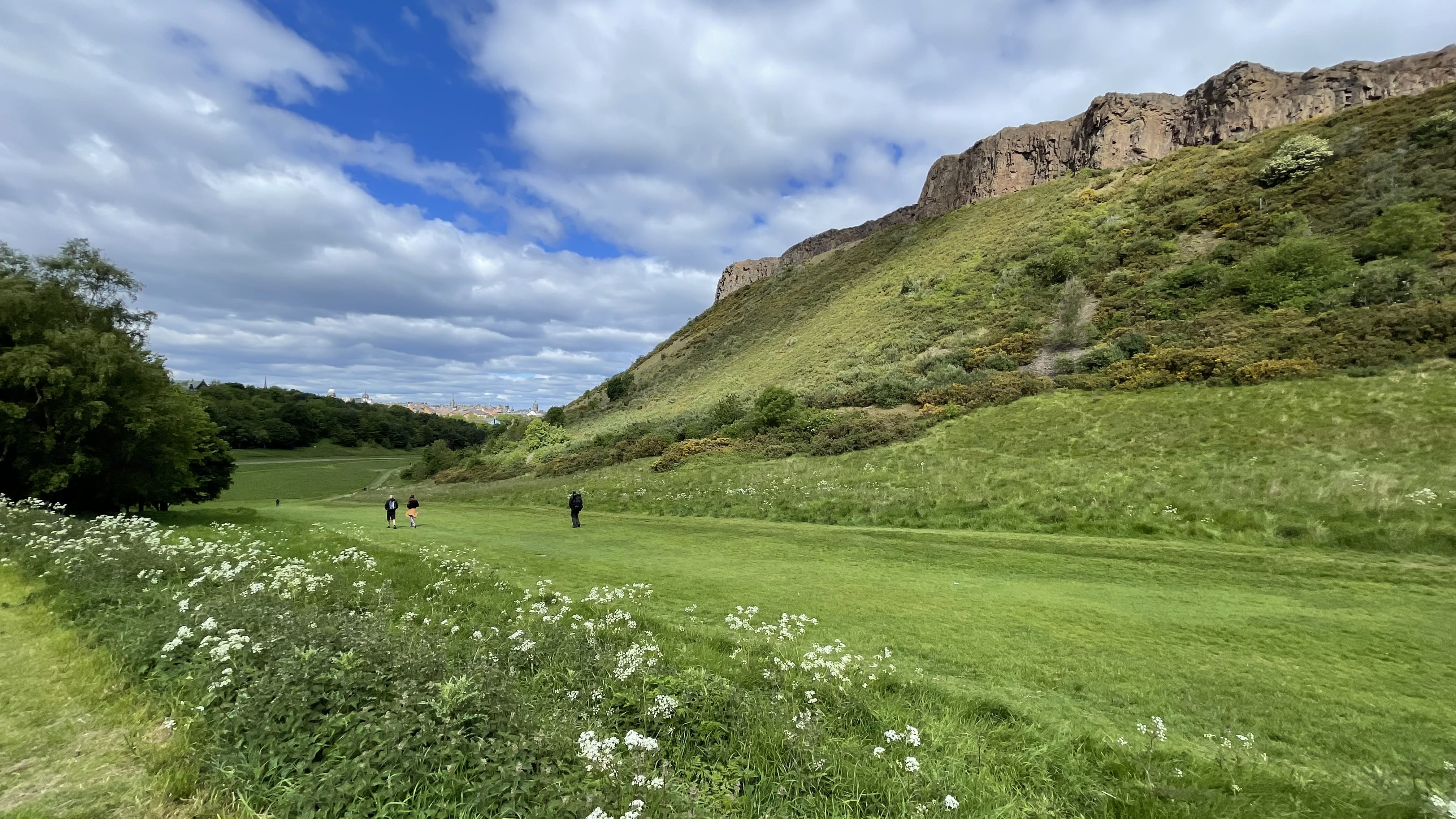 Walking trail beneath the cliffs of Holyrood Park, a must-see during 4 days in Edinburgh, Scotland.