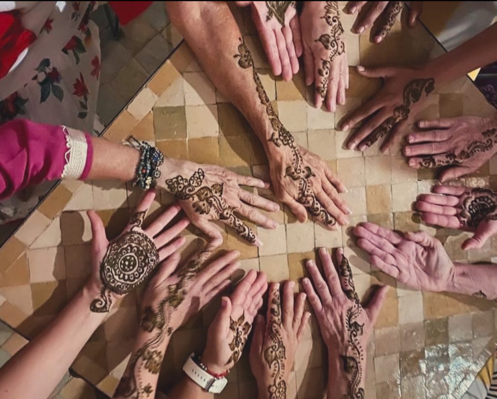 roup of hands decorated with henna designs, Marrakech – 2 days in Marrakech.
