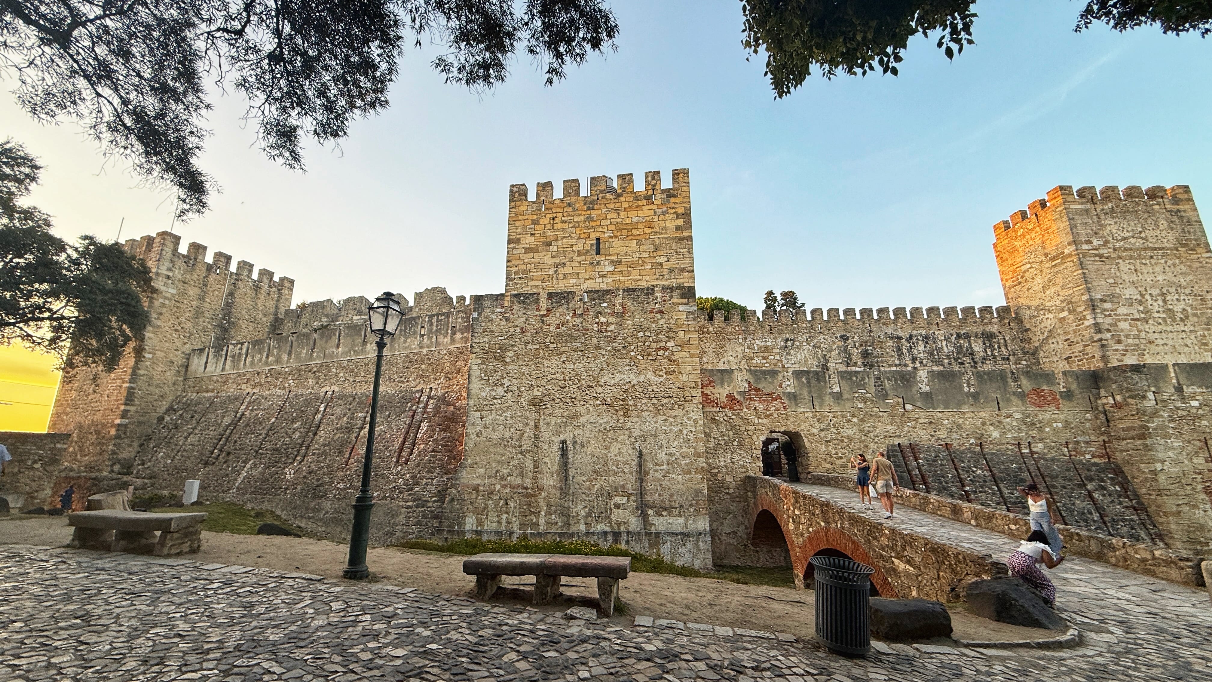 Stone walls and towers of Castelo de São Jorge at sunset in Lisbon, photographed during 5 Days in Lisbon.
