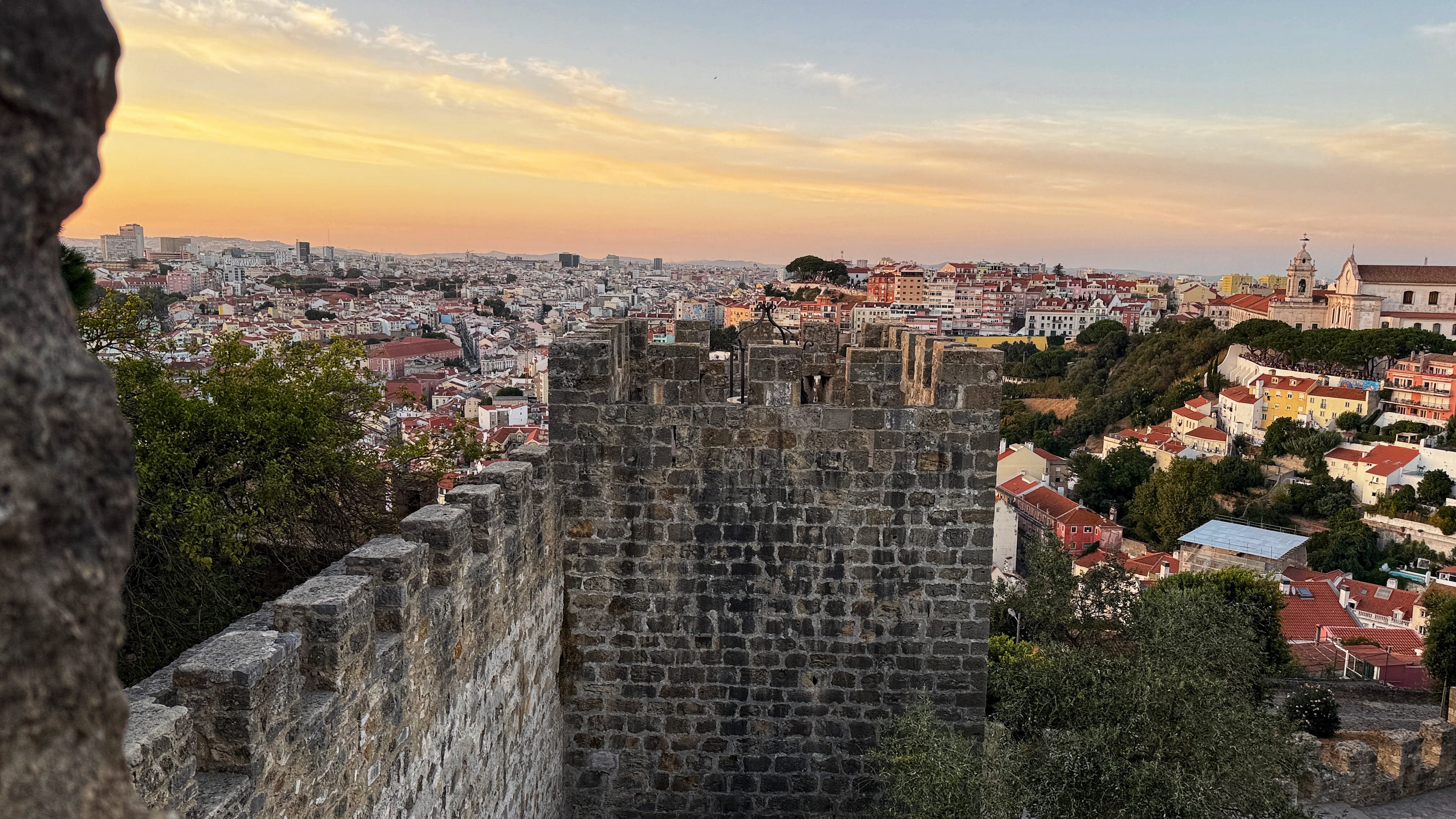 Panoramic sunset view of Lisbon from the towers of Castelo de São Jorge, photographed during 5 Days in Lisbon.
