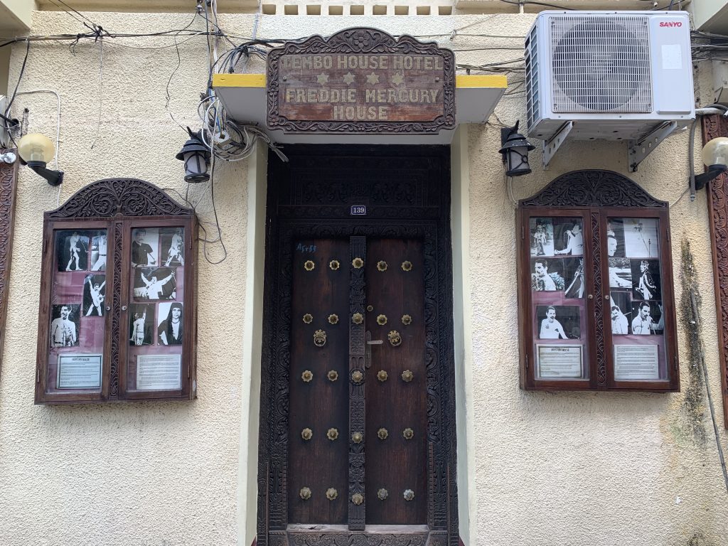 The entrance to the Tembo House Hotel and Freddie Mercury House in Stone Town, Zanzibar, with photos of Queen's lead singer.