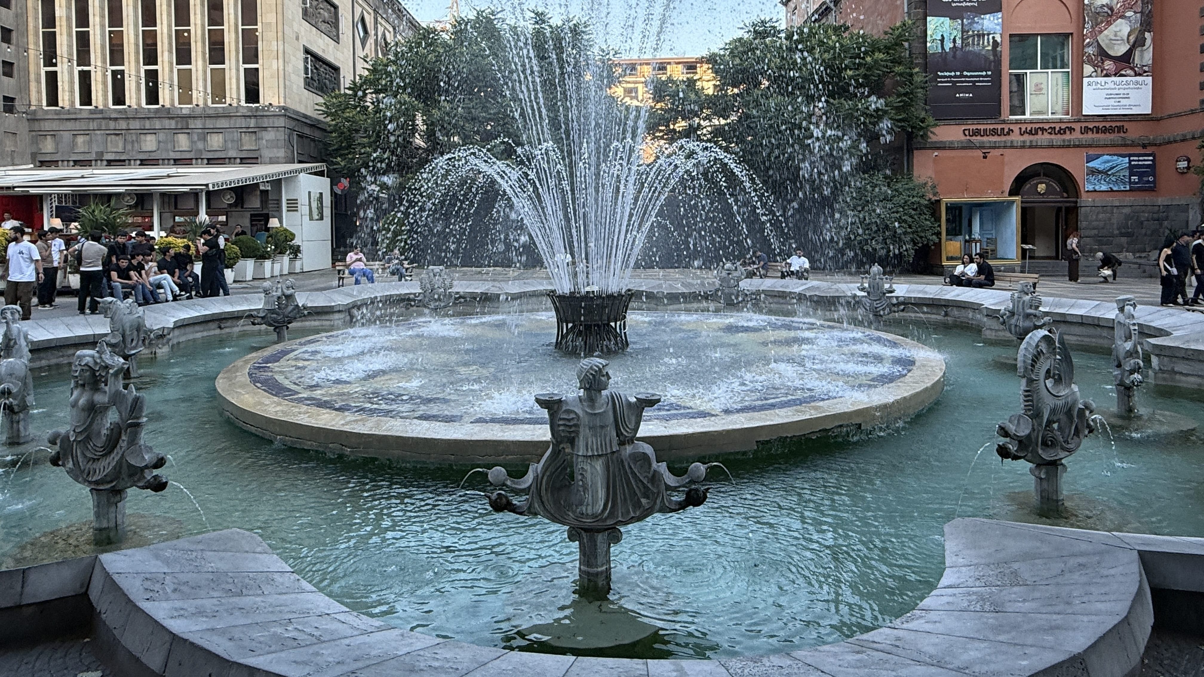 Zodiac Fountain in Charles Aznavour Square, Yerevan, Armenia, with water jets and sculpted figures of the 12 zodiac signs around the basin.