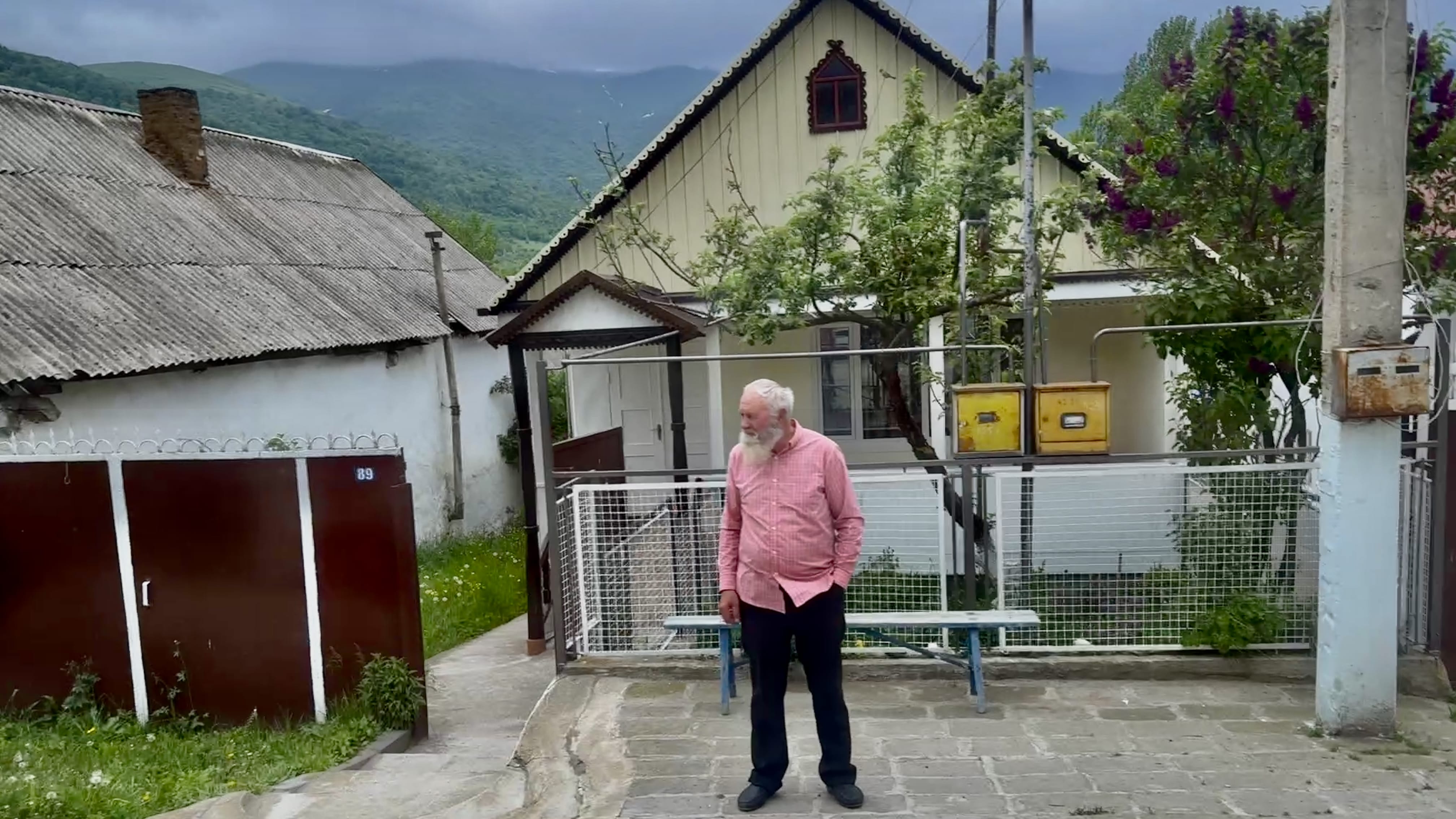 Molokan host standing outside his home in Armenia, photographed during seven days in Armenia.