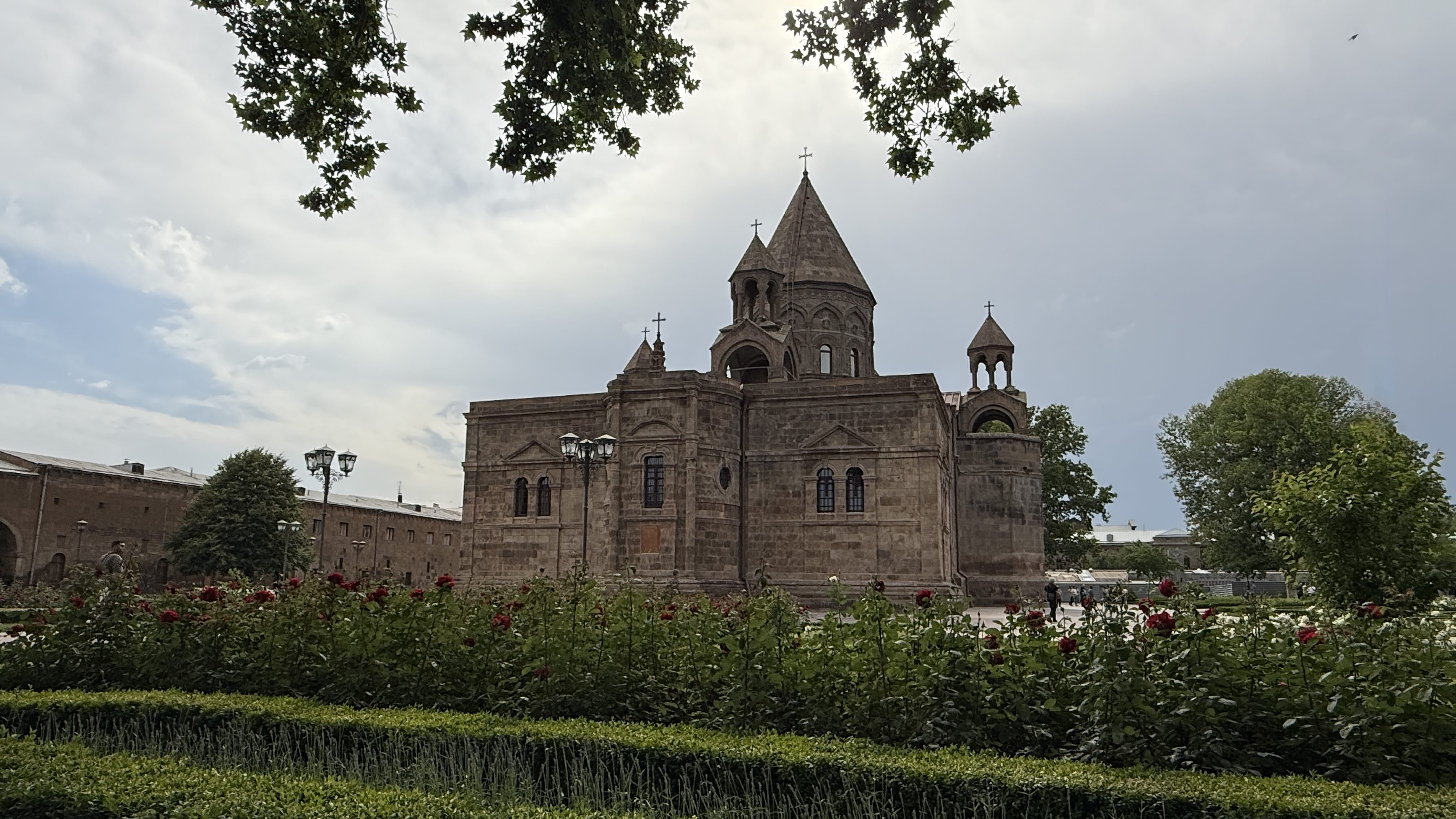 Exterior of Etchmiadzin Cathedral surrounded by rose gardens in Armenia, photographed during seven days in Armenia.