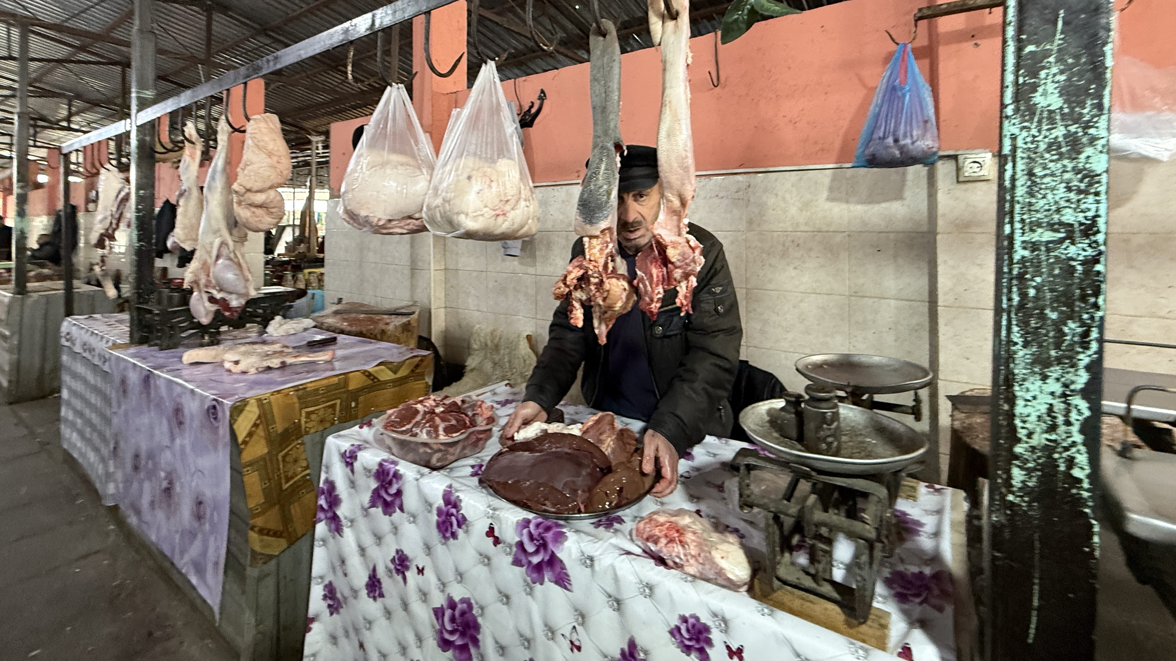 Butcher displaying fresh meat at the Sheki market, photographed during my 7 Days in Azerbaijan on the way to the Georgian border.