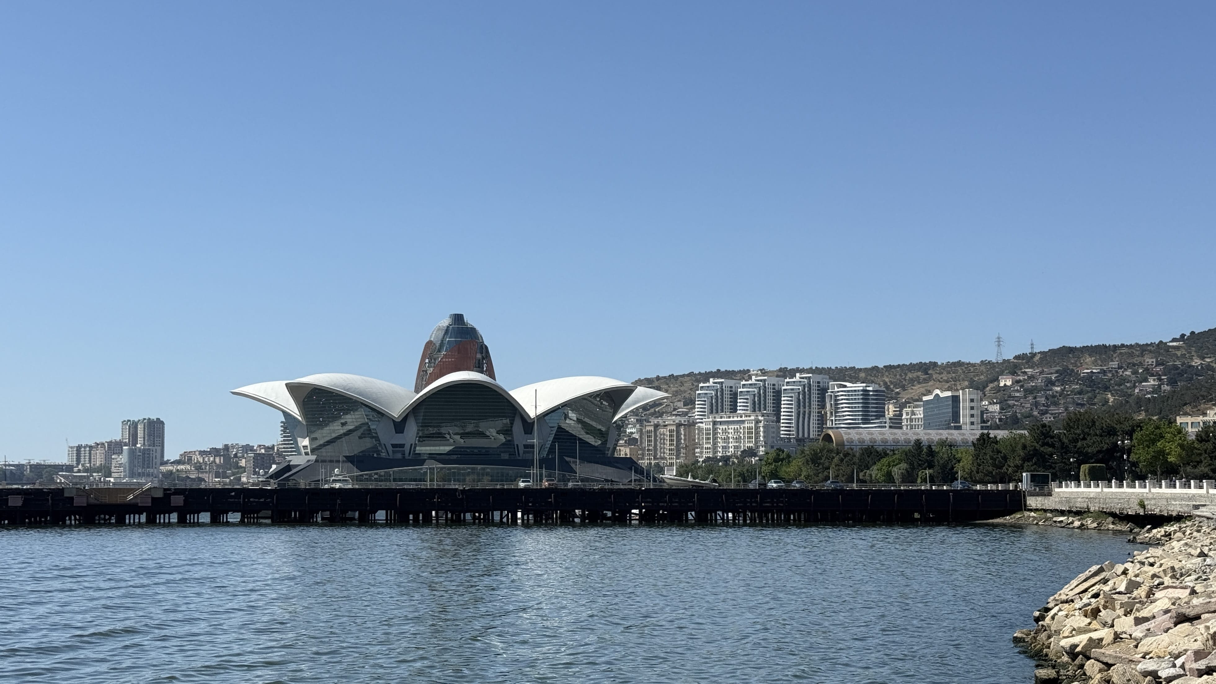 View of the modern Caspian Waterfront Mall shaped like a flower, seen from Baku Boulevard — 2 Days in Baku architecture.