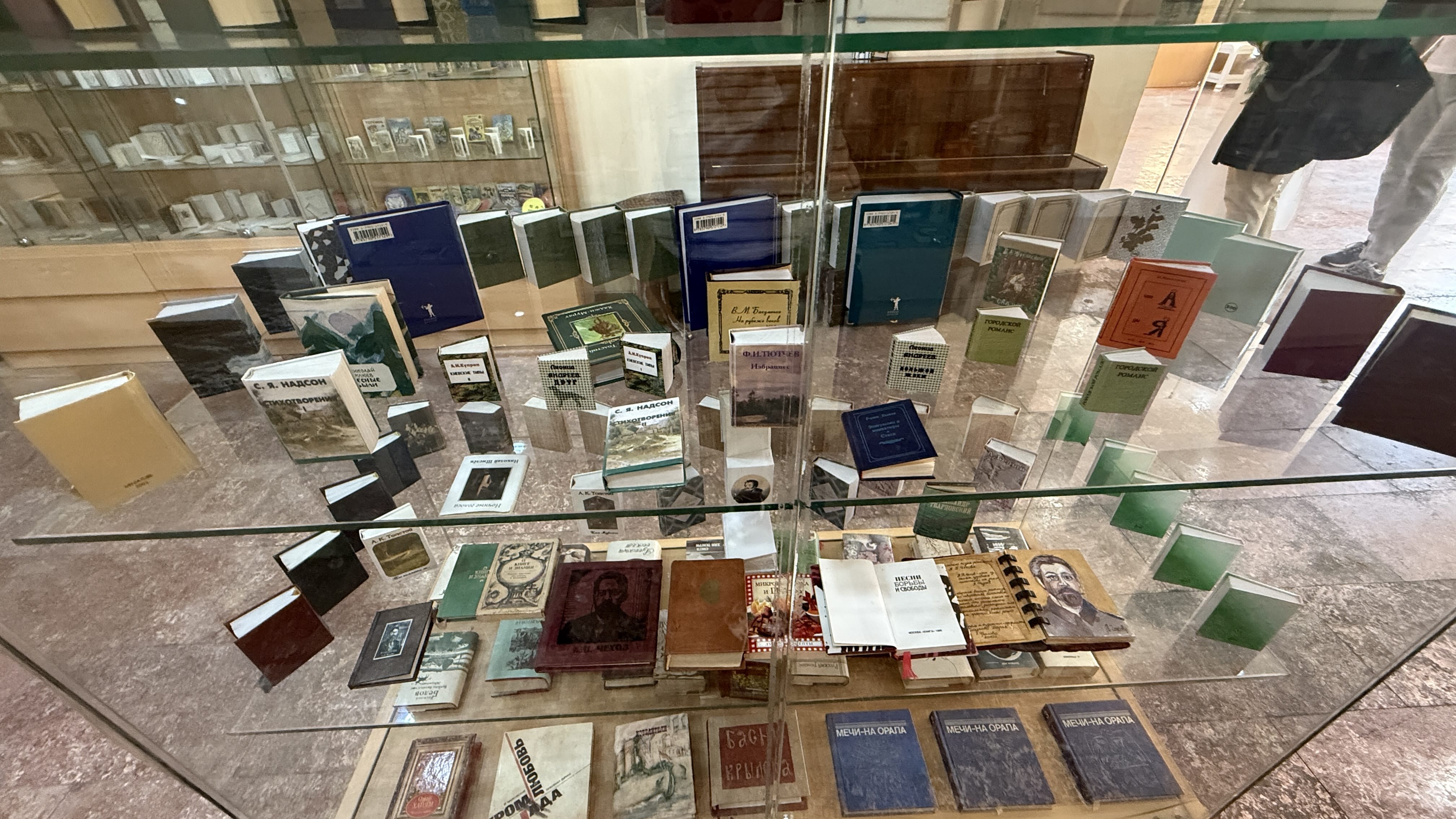 Display case filled with miniature books at the Baku Museum of Miniature Books, Azerbaijan — 2 Days in Baku museums.