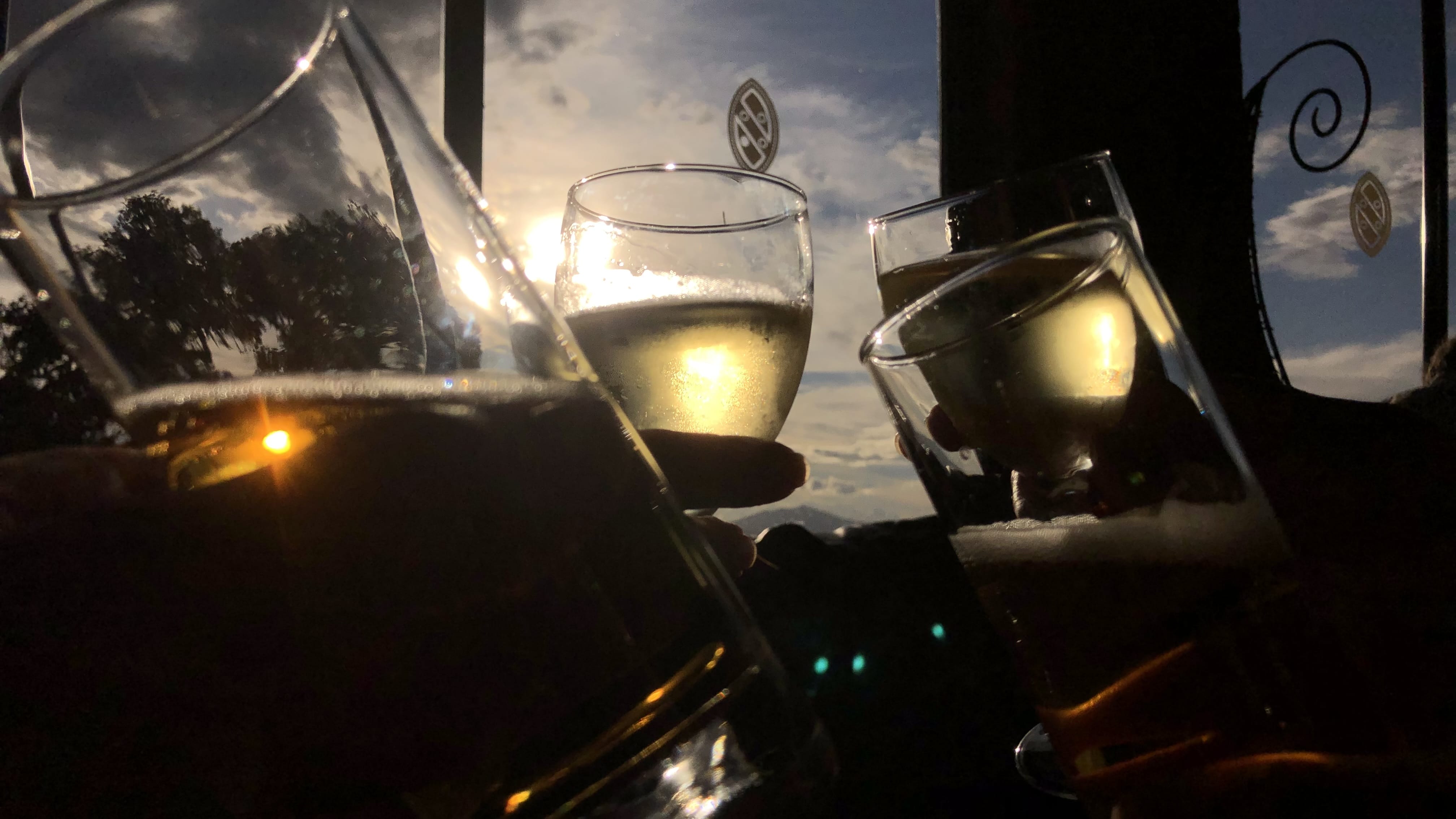 Drinks raised at sunset during a 7-Day Tanzania Safari at the Ngorongoro Crater Rim