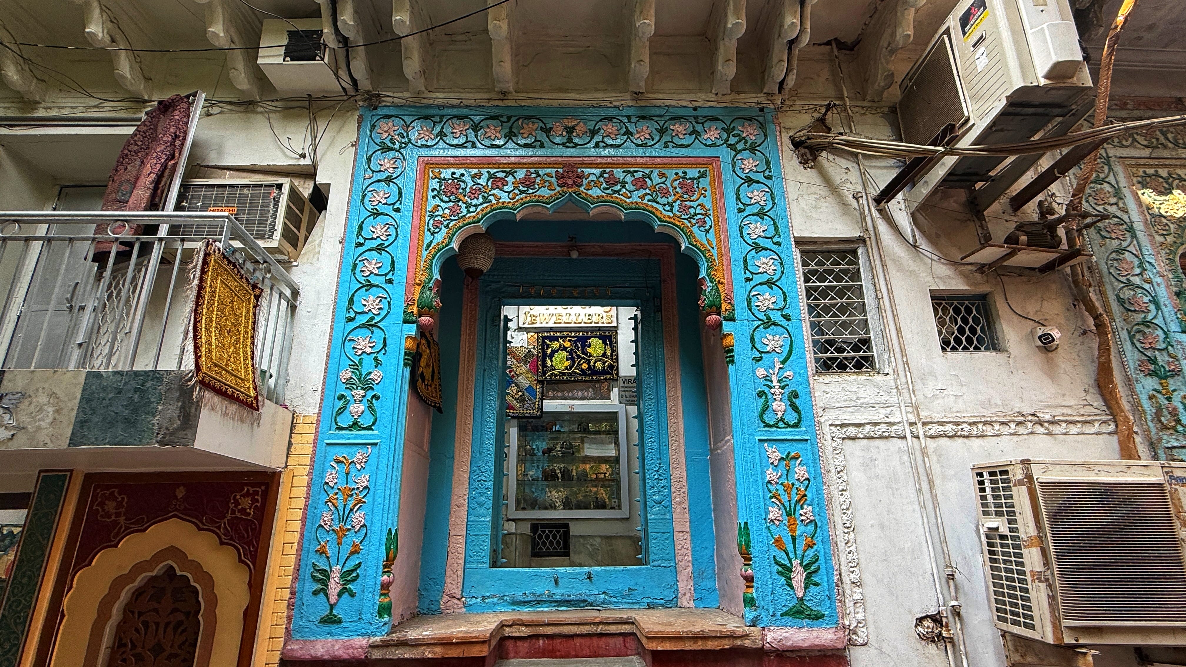 Colorful painted doorway in Old Delhi seen during my 2 Days in Delhi exploring markets and historic lanes.