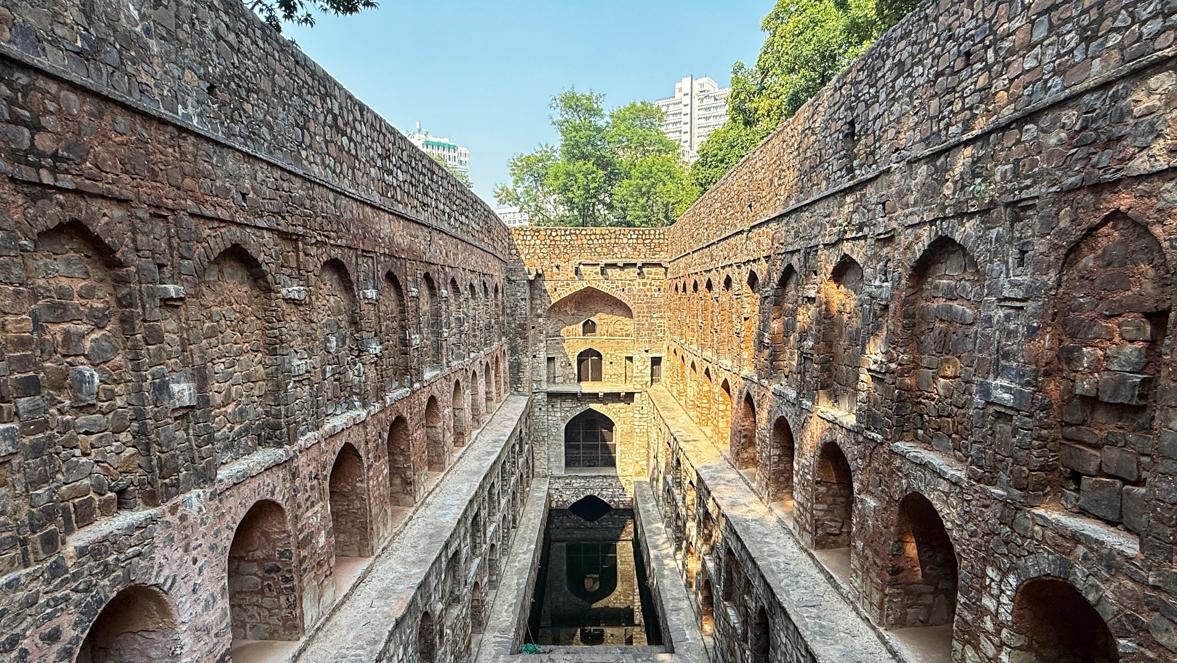Agrasen ki Baoli stepwell, a stop during my 2 Days in Delhi itinerary, showing its multi-level archways and reflective pool.