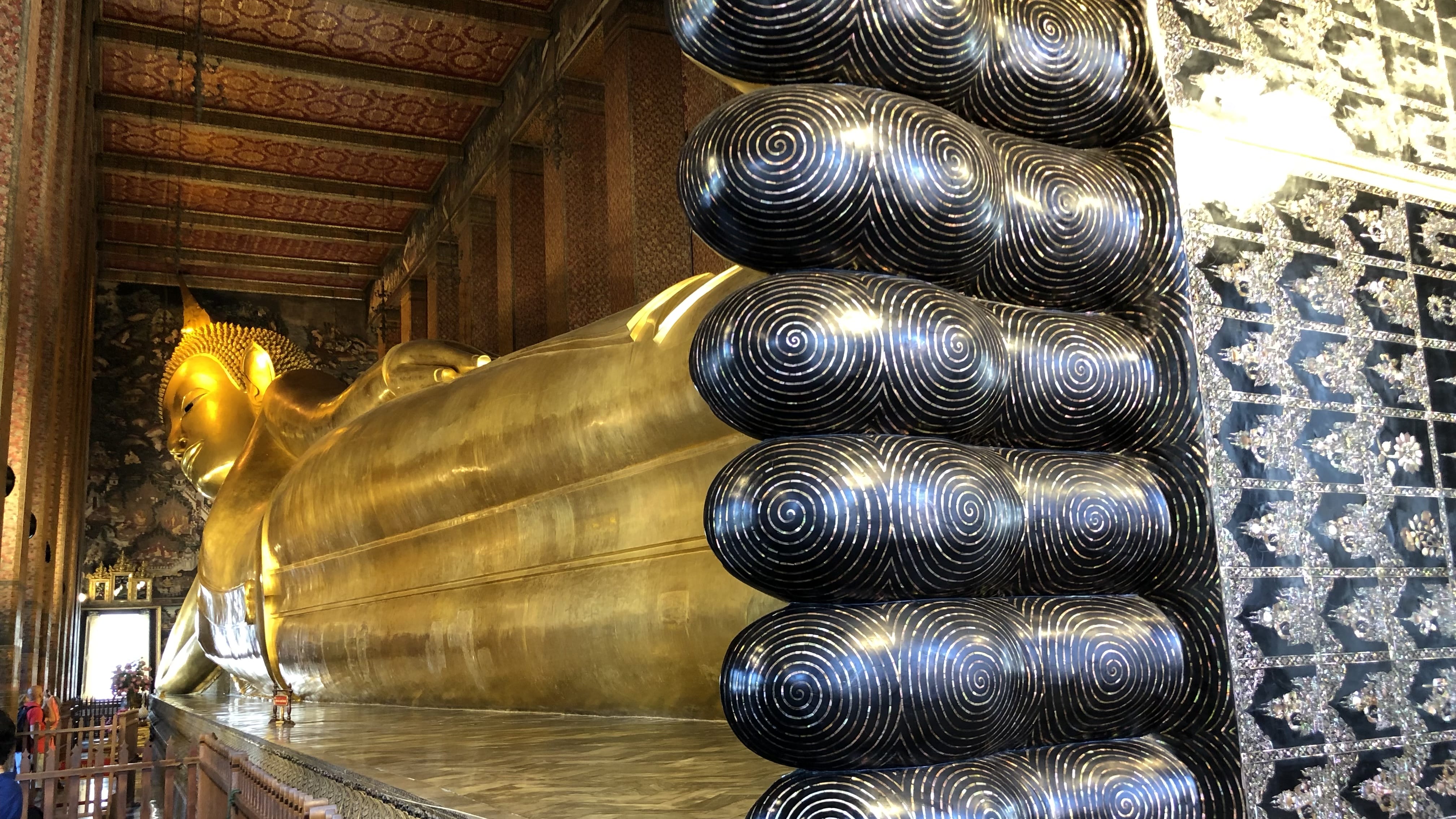 Close-up of the feet of the Reclining Buddha at Wat Pho decorated with mother-of-pearl inlay