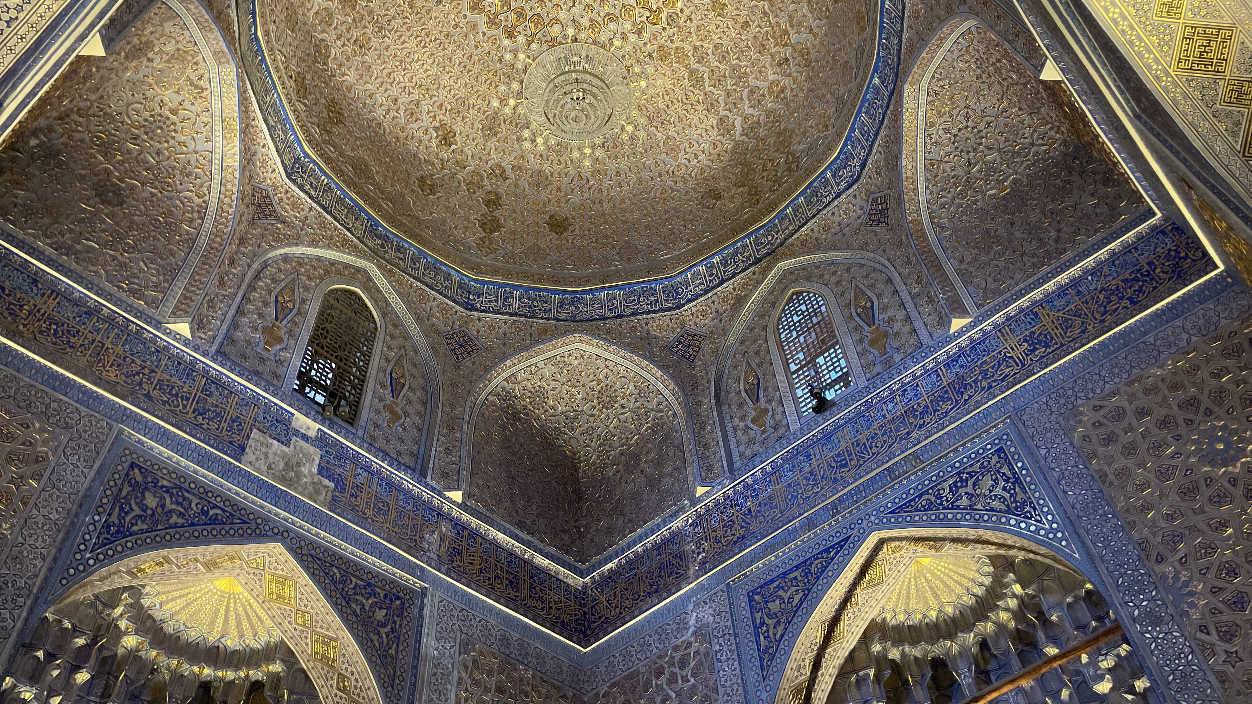 Interior dome of the Gur-e-Amir Mausoleum in Samarkand, Uzbekistan, with blue tilework and gold patterns, photographed during a 4 days in Uzbekistan itinerary.