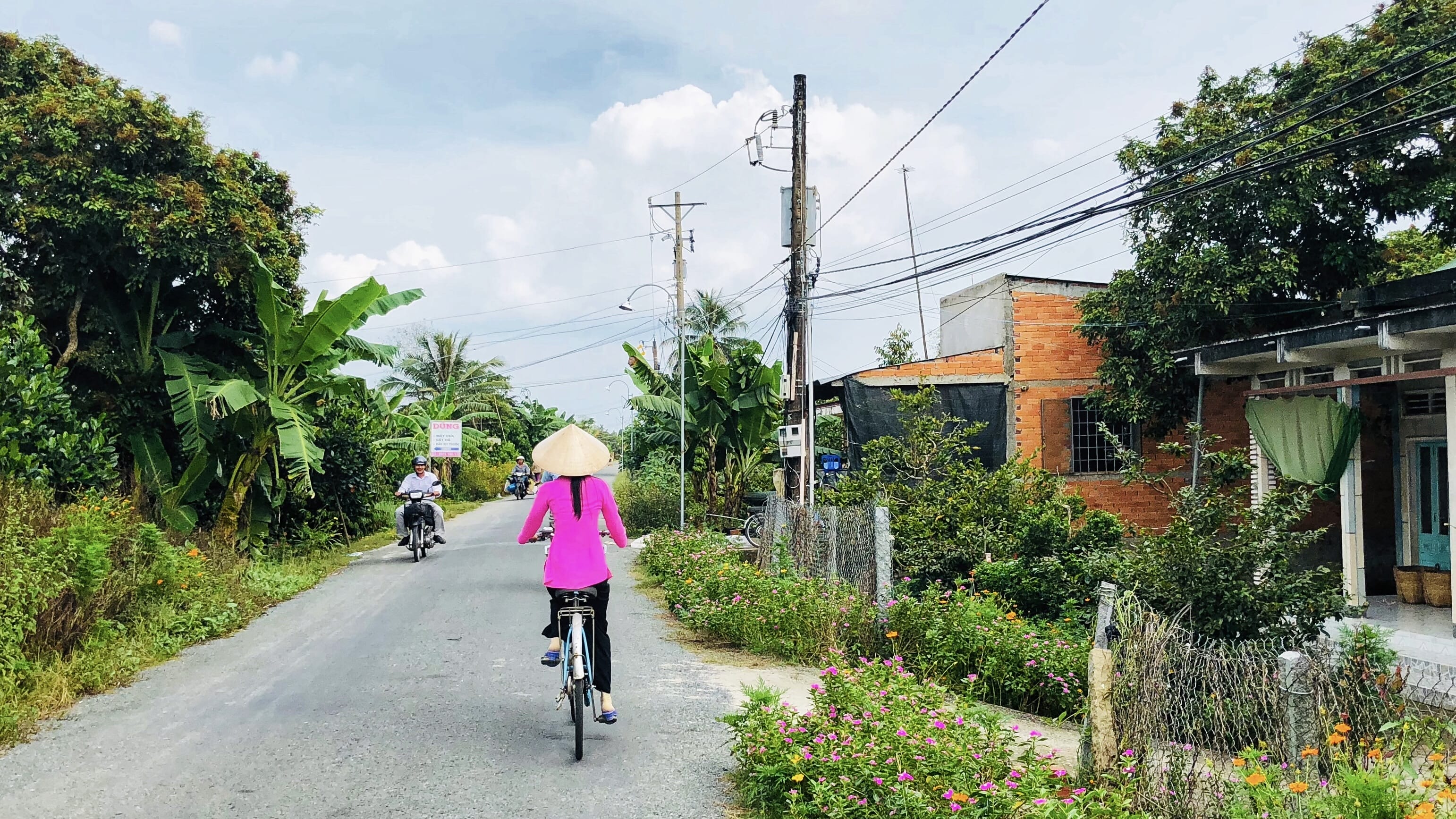Cycling through a rural Mekong Delta village during six days in Vietnam
