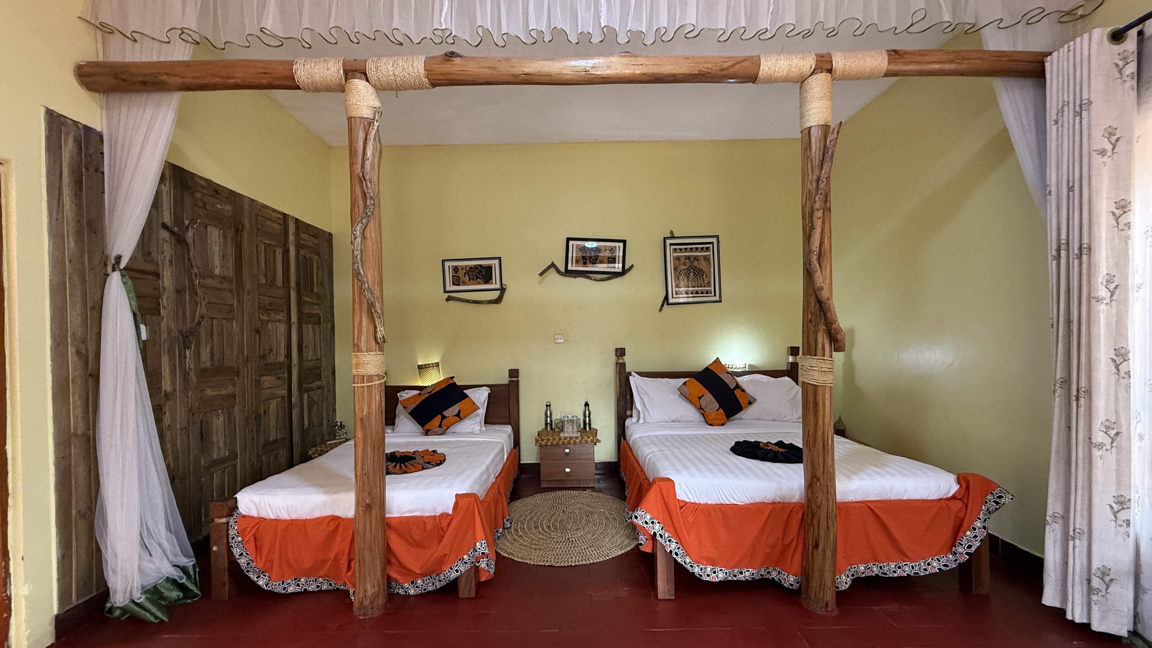 Twin beds inside safari lodge room in southwestern Uganda near Bwindi Impenetrable Forest - Five days in Uganda
