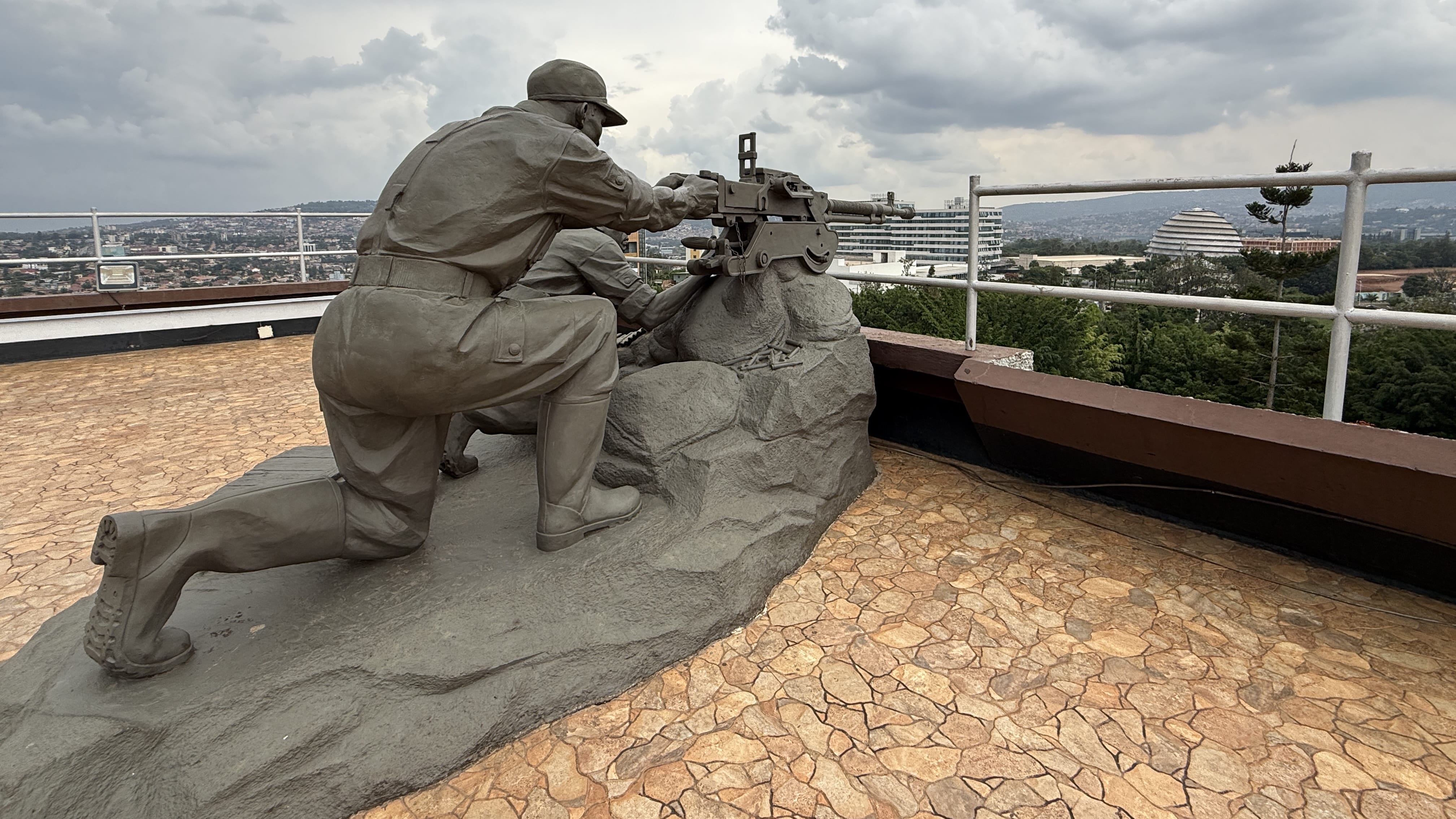 Statue of RPF soldiers overlooking Kigali at the Museum for the Campaign Against Genocide Rwanda