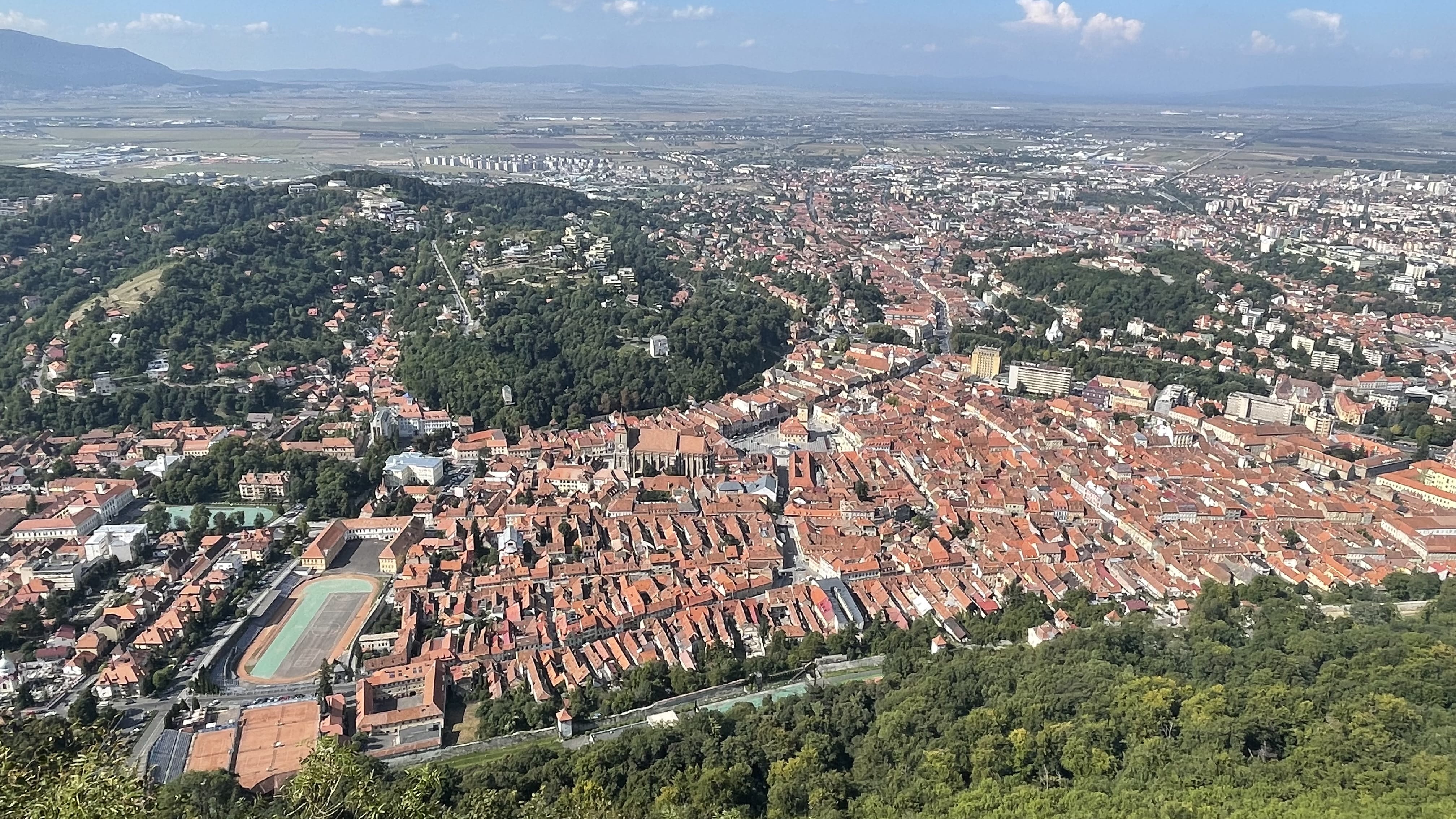 Panoramic view of Brașov Old Town from Tâmpa Mountain in Transylvania, Romania