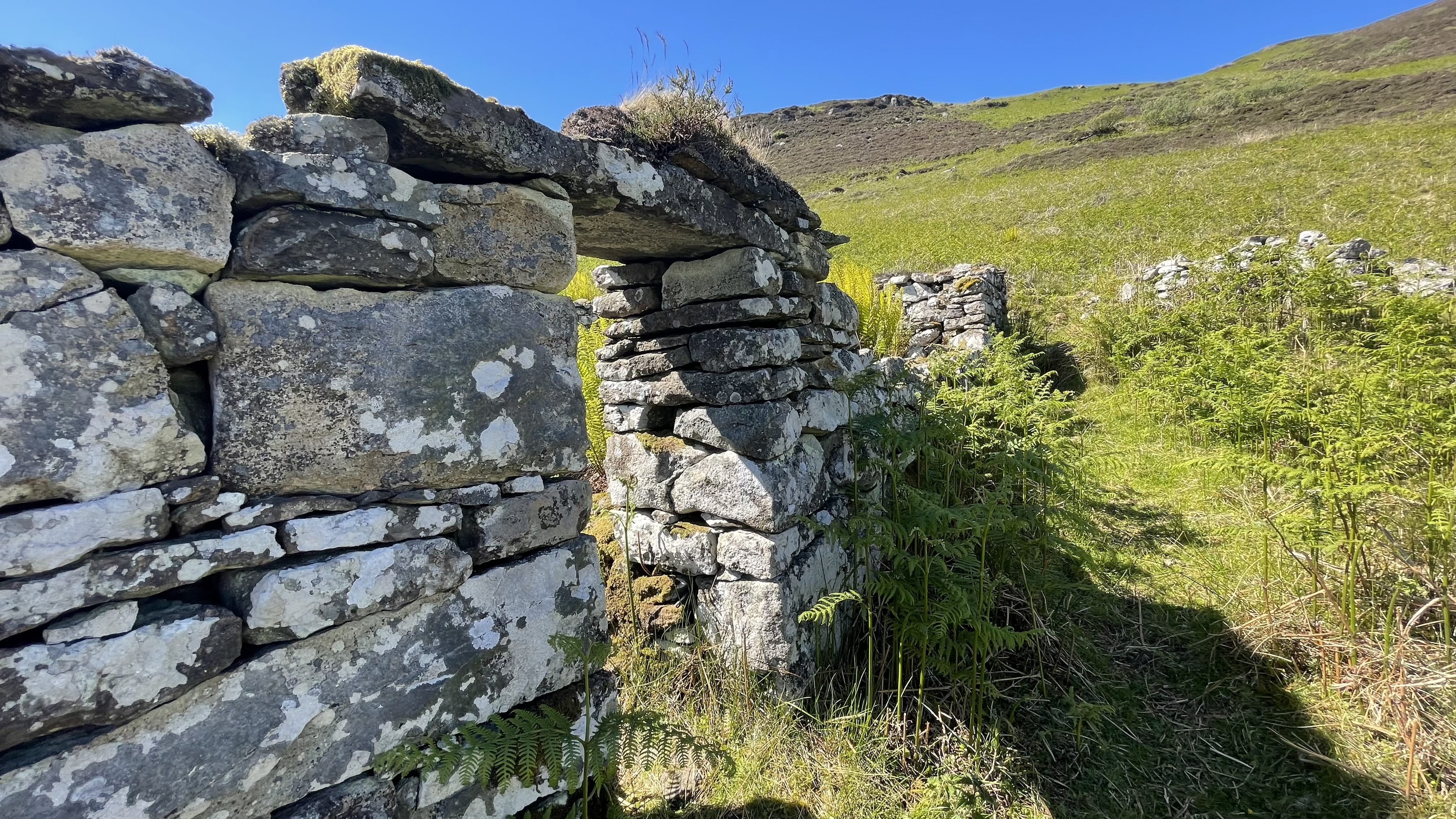 close-up of old stone wall and doorway ruins on Waternish Peninsula Isle of Skye