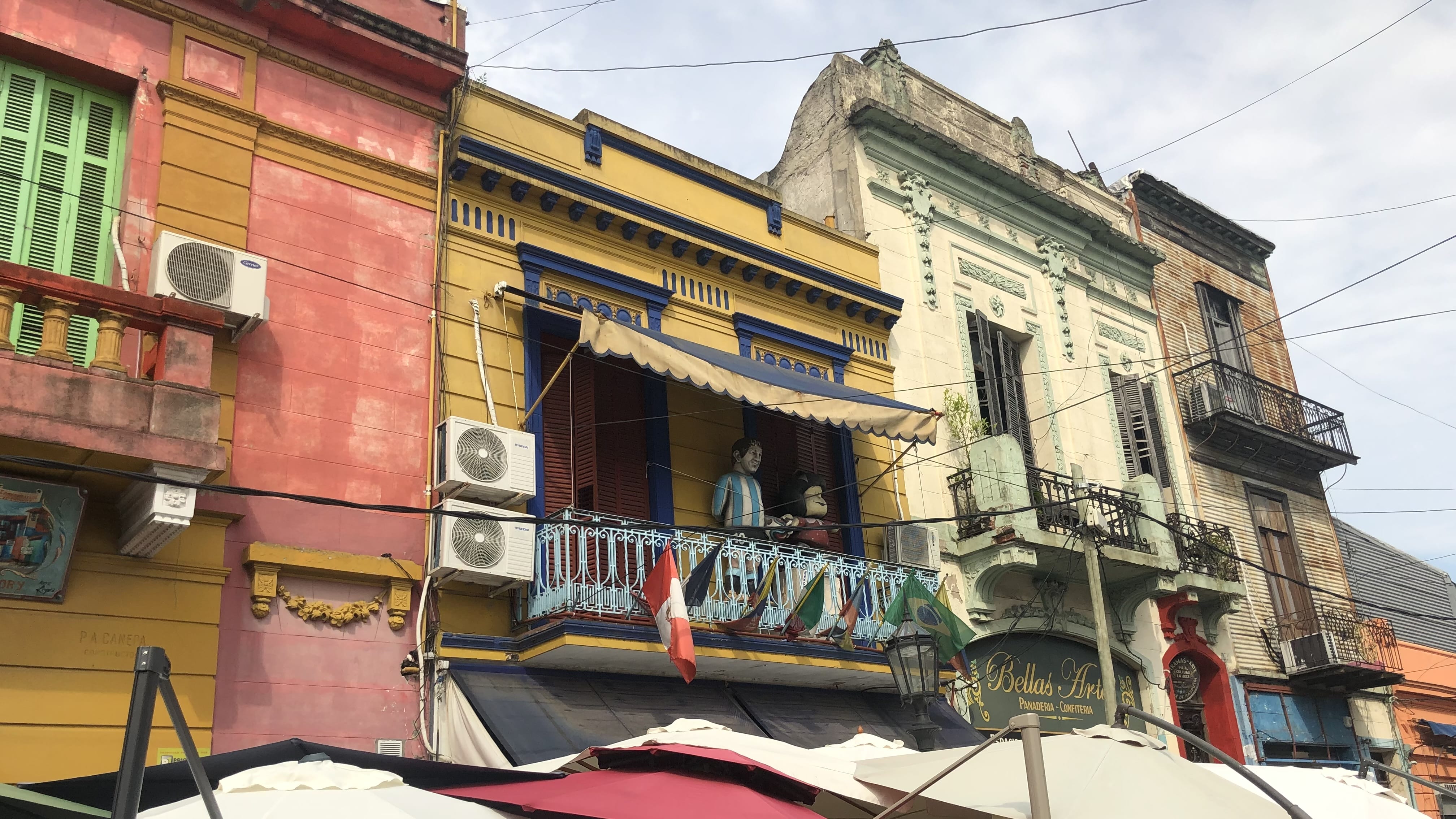 Brightly painted historic buildings along El Caminito in La Boca, Buenos Aires