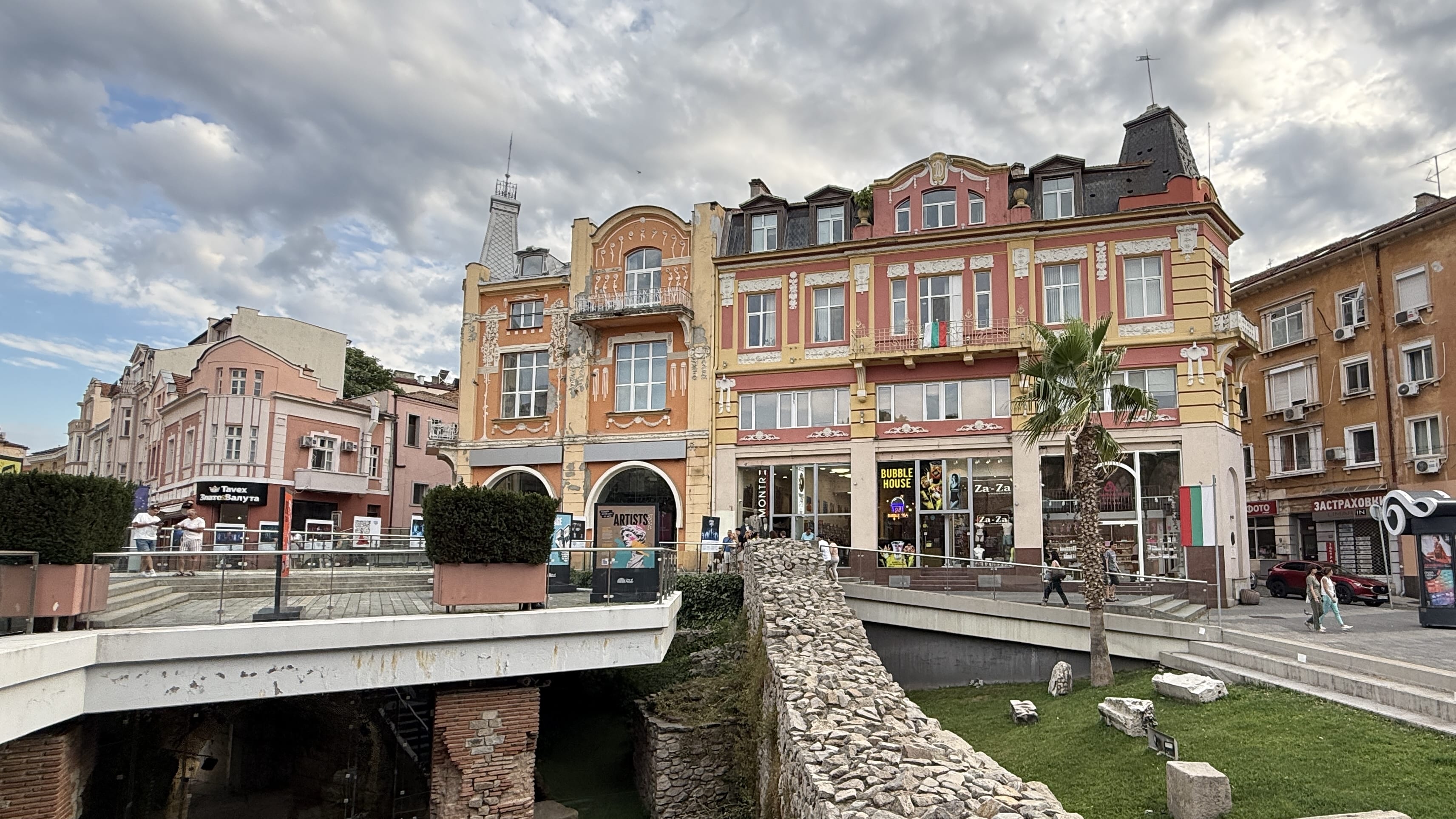 Colorful ornate buildings overlooking Roman ruins in central Plovdiv, Bulgaria