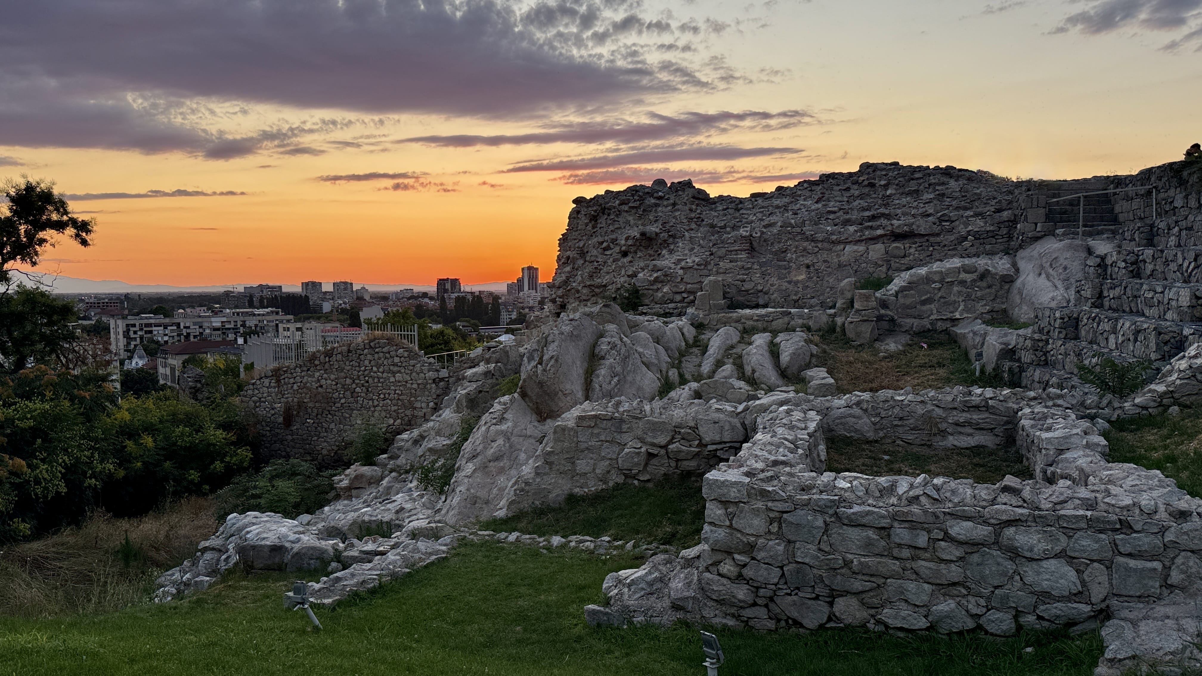 Ancient stone ruins at Nebet Tepe overlooking Plovdiv at sunset