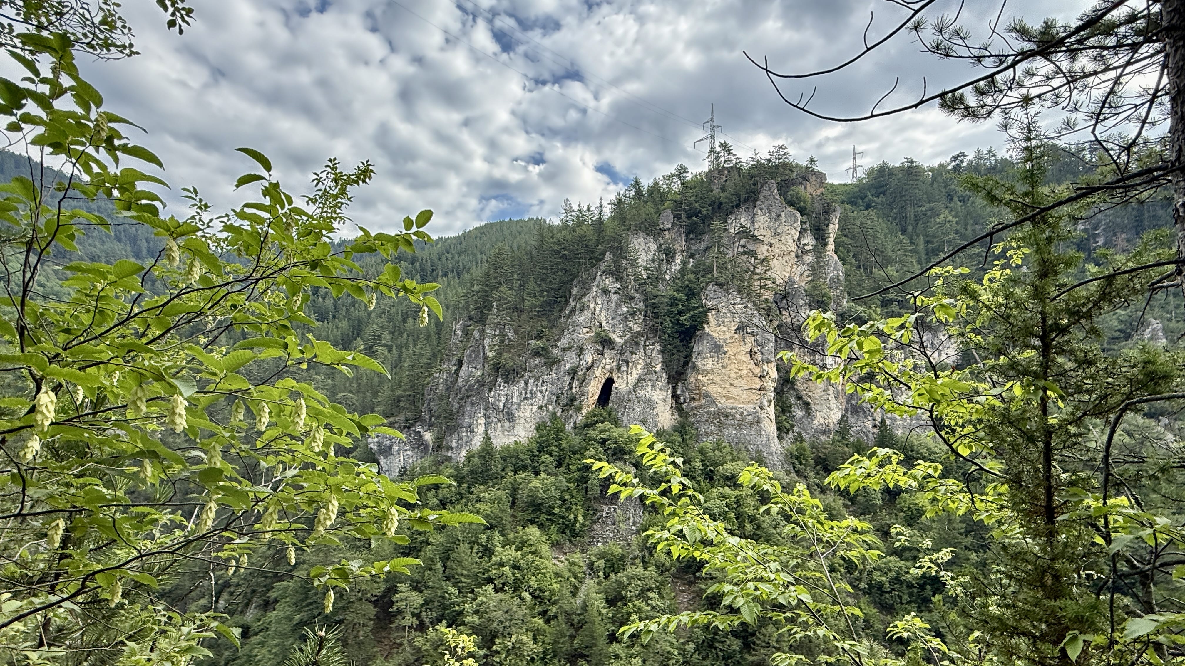 Limestone cliffs above Buynovo Gorge while hiking Bulgaria’s Rhodope Mountains