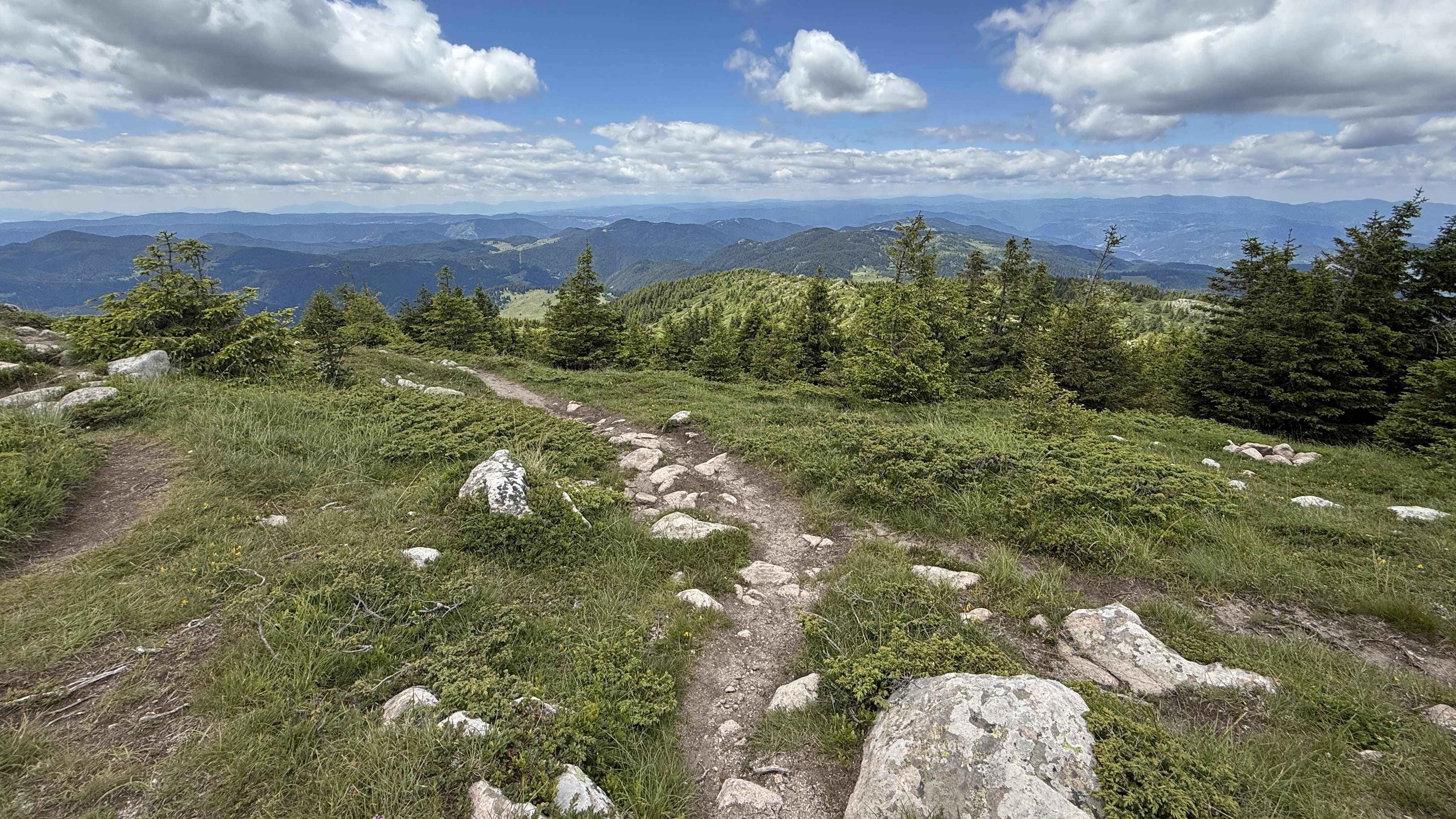Rocky mountain trail with panoramic views across Bulgaria’s Rhodope Mountains